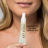 Indie Lee Lip Remedy Mask closeup showing ceramic applicator tip.