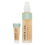 INDIE LEE Brightening Cleanser bottle and tube on a white background