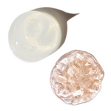 Swatches of Indie Lee facial cleansers on white background