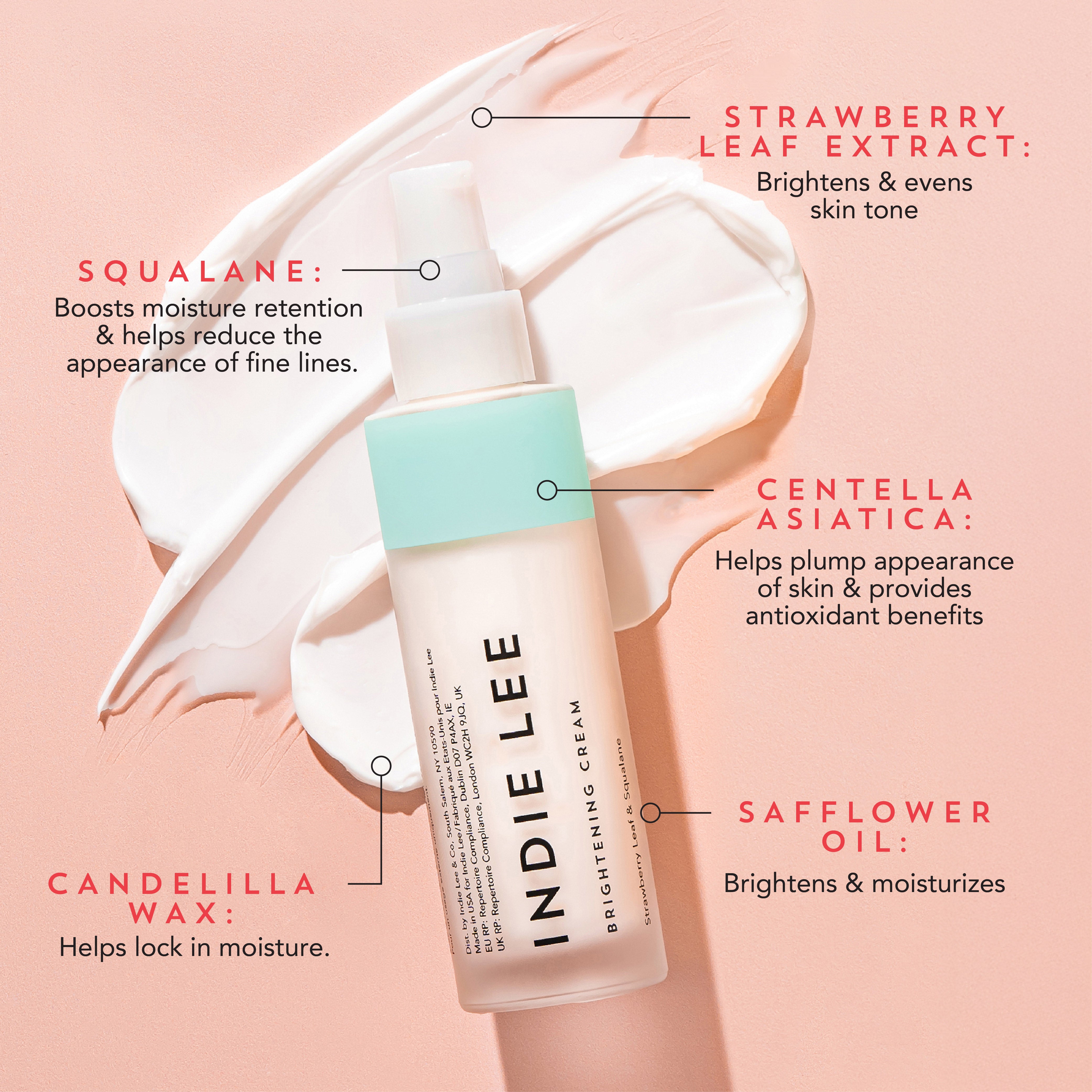 Indie Lee Brightening Cream bottle with ingredient labels on a pink background