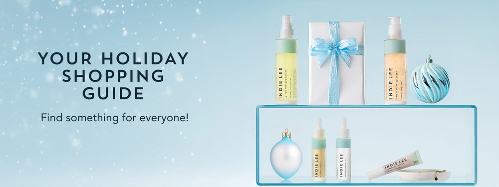 Indie Lee products on a shelf with 'Your Holiday Shopping Guide' text on a light blue background