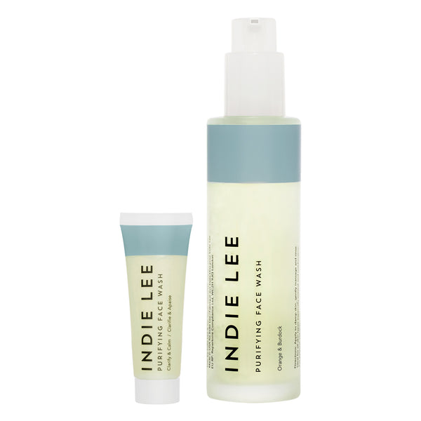 Indie Lee Purifying Face Wash bottle and tube on a white background