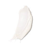 Swatch of Indie Lee Brightening Cream showing creamy white texture