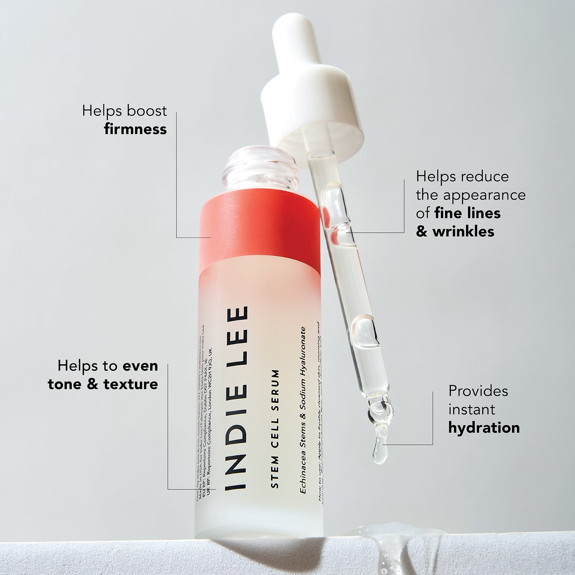 Indie Lee Stem Cell Serum bottle with dropper on a light gray background