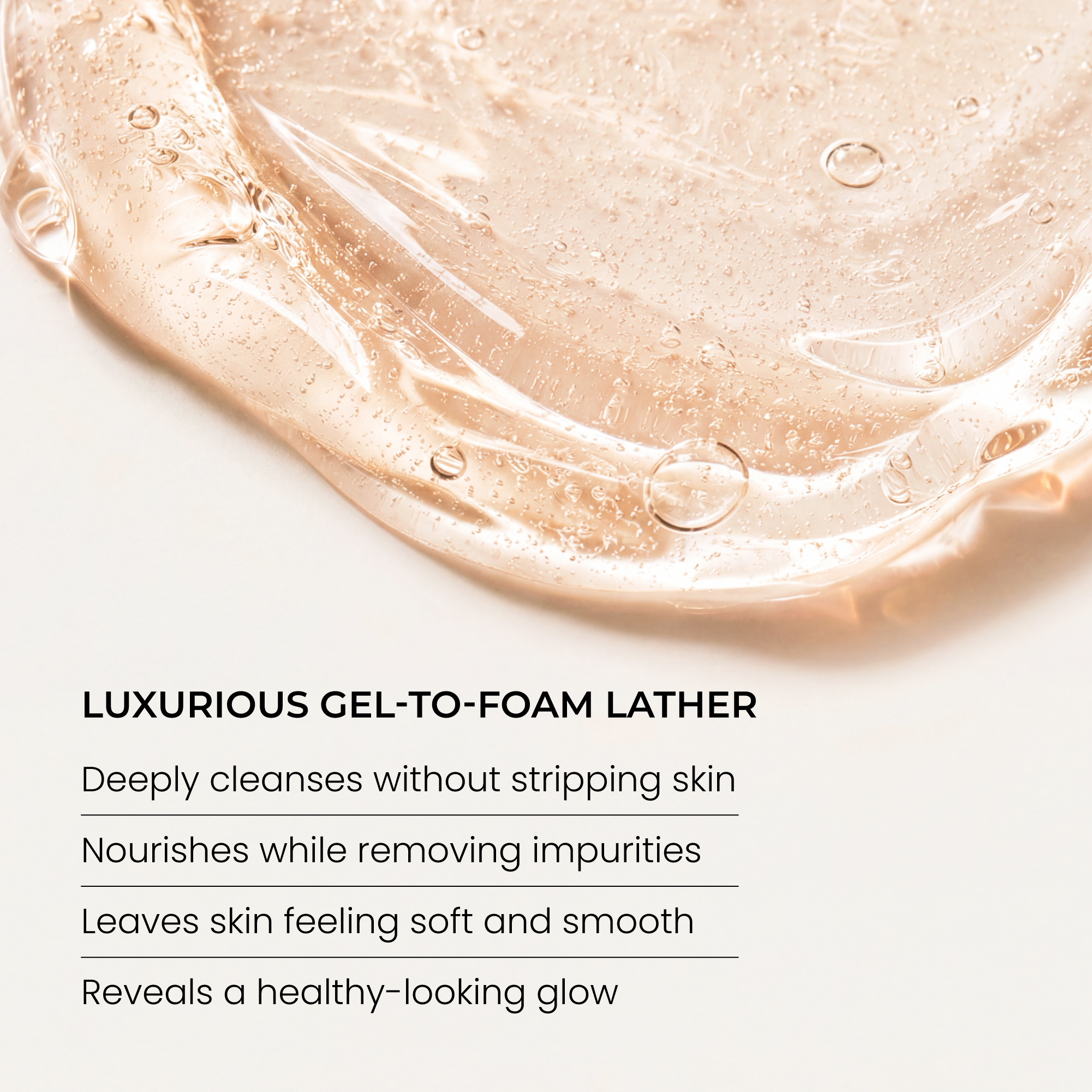 A close-up swatch of Indie Lee Brightening Cleanser on a white background with text below reading 'LUXURIOUS GEL-TO-FOAM LATHER' and product benefits.